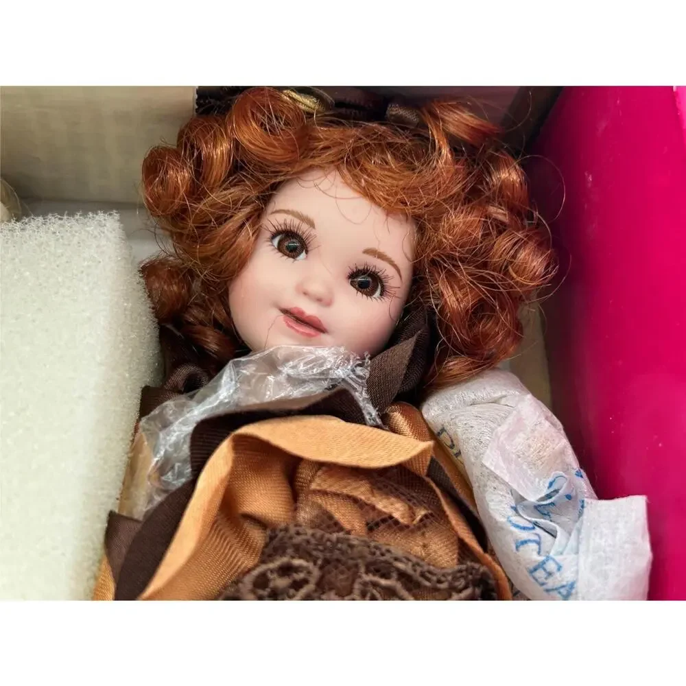 Marie Osmond Fine Porcelain Collector Doll - Raspberry Swiss Chocolate Turtle